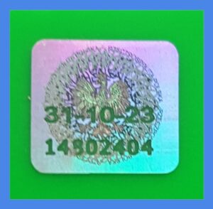 wzór A hologramu studenckiego na legitymację z numerem seryjnym i datą 31-10-23